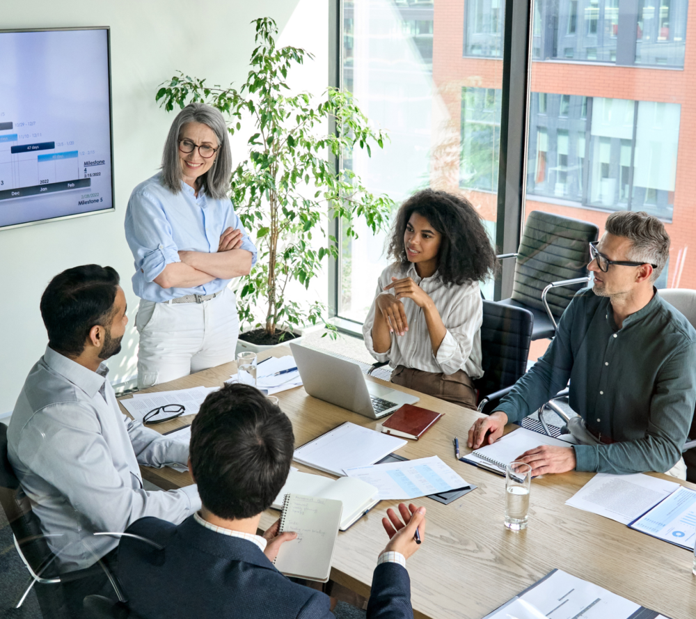 Team meeting in a modern conference room.